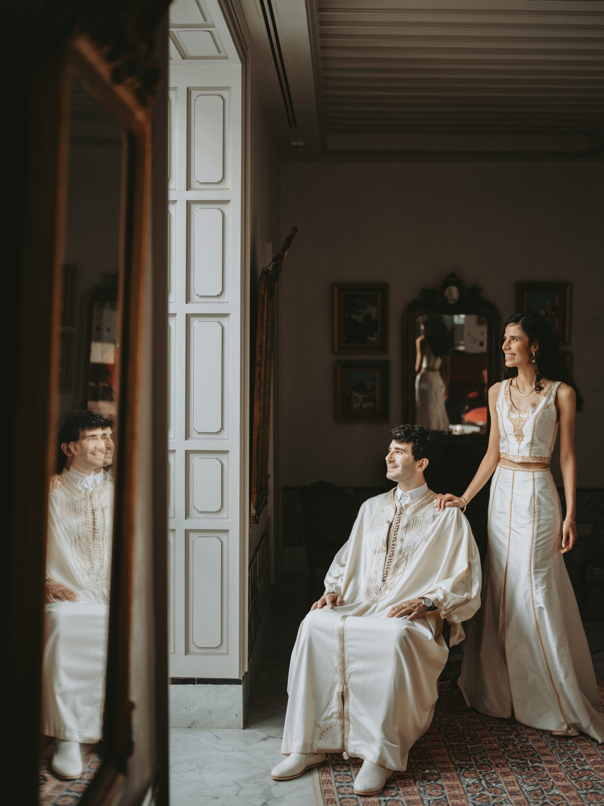 Groom holding bride